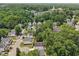 An aerial view showing the community's beautiful landscaping and proximity to the forest at 137 Cricketgrass Dr, Cary, NC 27513