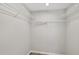 Walk-in closet featuring ample wire shelving for organized storage solutions at 137 Cricketgrass Dr, Cary, NC 27513