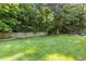 Expansive backyard with a well-maintained lawn, ideal for Gathering activities and outdoor gatherings at 321 Wescott Ridge Dr, Holly Springs, NC 27540