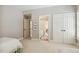 Bright bedroom with an ensuite bathroom and closet, offering a serene and private space at 321 Wescott Ridge Dr, Holly Springs, NC 27540