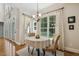 Cozy breakfast nook with natural light, stylish curtains, and a view of the backyard at 321 Wescott Ridge Dr, Holly Springs, NC 27540
