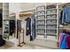 Walk-in closet with custom built in shelving and storage at 321 Wescott Ridge Dr, Holly Springs, NC 27540