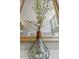 Stylish vase with floral arrangement adds elegance to this bright, neutral room at 321 Wescott Ridge Dr, Holly Springs, NC 27540