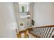 Grand foyer with wood and carpet staircase, complemented by a decorative light fixture at 321 Wescott Ridge Dr, Holly Springs, NC 27540