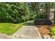 Neighborhood paved path leading through lush greenery, perfect for walking or biking at 321 Wescott Ridge Dr, Holly Springs, NC 27540