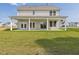Backyard view of a spacious covered patio, perfect for outdoor entertaining at 323 Flourishing Street, Sanford, NC 27330
