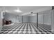 Expansive basement area featuring black and white checkerboard flooring at 516 Ivey Rd, Graham, NC 27253