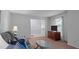 Welcoming living room featuring a comfortable sofa, TV, and plenty of natural light at 516 Ivey Rd, Graham, NC 27253