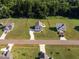 Aerial view showcasing the home's location in a quiet, residential neighborhood at 5215 Goshawk Ln, Graham, NC 27253