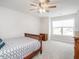 Bedroom with hardwood floors and a ceiling fan at 5215 Goshawk Ln, Graham, NC 27253