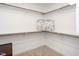 Walk-in closet with shelves and hanging rods at 5215 Goshawk Ln, Graham, NC 27253
