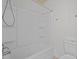 Bathroom with white shower-tub combination, and toilet at 545 Barnette Rd, Louisburg, NC 27549