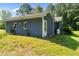 View of the side of the home, showcasing the siding and landscaping at 545 Barnette Rd, Louisburg, NC 27549