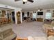 Expansive open-concept living space with a dining area, kitchen, and comfortable seating at 555 Hinnant Rd, Selma, NC 27576