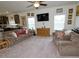 Spacious living room featuring two sofas, hardwood floors and large windows at 555 Hinnant Rd, Selma, NC 27576
