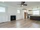 Spacious living room with fireplace, built-in cabinets, and open-concept design at 1221 Barreto Dr, Wendell, NC 27591