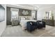 Stylish main bedroom with neutral tones, plush carpeting, elegant furnishings, and natural light at 1234 Sirius Lot 6 Dr, Sanford, NC 27330