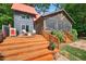 Beautiful home exterior featuring a spacious deck and a screened-in porch perfect for outdoor living at 133 Acorn Ln, Pittsboro, NC 27312