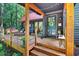 Inviting front porch with cozy seating and decorative touches, perfect for relaxing and enjoying the outdoors at 133 Acorn Ln, Pittsboro, NC 27312