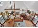 Open living room with vaulted ceiling, cozy seating area, and dining space perfect for entertaining at 133 Acorn Ln, Pittsboro, NC 27312