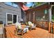 Inviting outdoor patio with cozy seating, potted plants, and a relaxing ambiance, perfect for enjoying the outdoors at 133 Acorn Ln, Pittsboro, NC 27312
