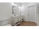 Bathroom with dual vanities and a sleek glass shower at 1408 South St, Durham, NC 27707