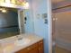 Full bathroom has a sink and vanity with an en suite at 204 Southland Dr, Zebulon, NC 27597