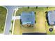 Bird's-eye view of home featuring a backyard deck and pristine lawn at 300 Ledge Manor Dr, Holly Springs, NC 27540