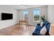 Bonus room with foosball table, large TV and comfortable sofa at 300 Ledge Manor Dr, Holly Springs, NC 27540
