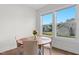 Cozy dining area with natural light and views of backyard at 300 Ledge Manor Dr, Holly Springs, NC 27540