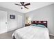 Comfortable bedroom features carpet, ceiling fan, art and good lighting at 4 Galaxy Ct, Durham, NC 27705
