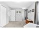 Bright and neutral bedroom with carpet floors, closet, and natural light at 4 Galaxy Ct, Durham, NC 27705