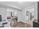 Open living room and office space feature hardwood floors and plenty of natural light at 4 Galaxy Ct, Durham, NC 27705