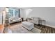 Bright living room offers wood floors, neutral paint, and comfortable seating at 4 Galaxy Ct, Durham, NC 27705