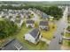 An aerial view of a neighborhood shows well-maintained homes and tree-lined streets at 4014 White Kestrel Dr, Raleigh, NC 27616