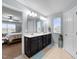 Bathroom features a double sink vanity, large mirror, and natural light with an attached bedroom at 4014 White Kestrel Dr, Raleigh, NC 27616