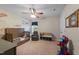 Spacious bedroom featuring an airplane mural, ceiling fan and play area for activities at 4014 White Kestrel Dr, Raleigh, NC 27616
