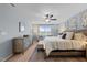 Spacious main bedroom with a king bed, dresser, and a sitting area at 4014 White Kestrel Dr, Raleigh, NC 27616