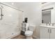 Clean and modern bathroom with a tiled shower, updated vanity, and neutral decor at 5840 Fayetteville Rd, Raleigh, NC 27603