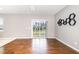 Bright dining area with sliding glass doors leading to the outdoor patio space at 812 Teal Lake Dr, Holly Springs, NC 27540