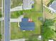 Aerial view of a charming home in a well-maintained community and backyard at 104 Roscommon Ln, Clayton, NC 27520