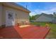 Backyard deck with outdoor seating, a fire pit, and easy access to the lawn at 104 Roscommon Ln, Clayton, NC 27520