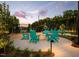 Cozy outdoor fire pit area with ample seating, perfect for evening gatherings at 194 Aspen Ave, Pittsboro, NC 27312