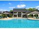 Stunning community pool and lounge area with ample seating for relaxation and socializing at 194 Aspen Ave, Pittsboro, NC 27312