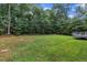 Lush backyard showcasing a well-maintained lawn at 2003 Zbonack Ct, Creedmoor, NC 27522