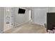 Bedroom with an open view into the bathroom and large closets for ample storage space at 2003 Zbonack Ct, Creedmoor, NC 27522