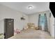Well-lit playroom with storage shelves, a comfortable chair, and plenty of space at 2003 Zbonack Ct, Creedmoor, NC 27522