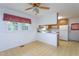 Functional kitchen with wooden cabinets and white appliances at 3603 Grimes Ave, Durham, NC 27703