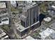 Aerial view of high-rise building construction site, showing surrounding neighborhood and streets at 400 W Main St # 2007, Durham, NC 27701