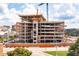 View of the building under construction, showing the structural framework and the ongoing development process at 400 W Main St # 2007, Durham, NC 27701